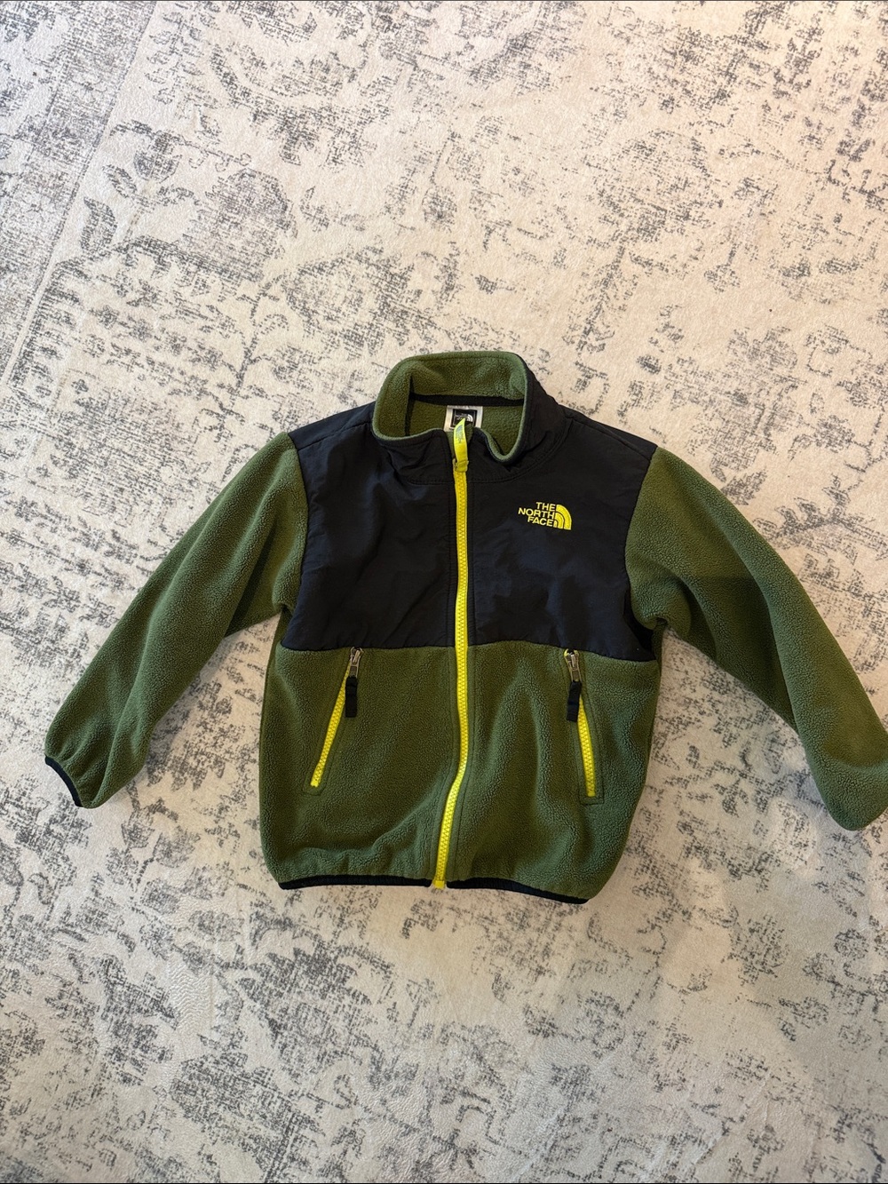 The North Face Olive and Black Kids Fleece Jacket with Yellow Zipper